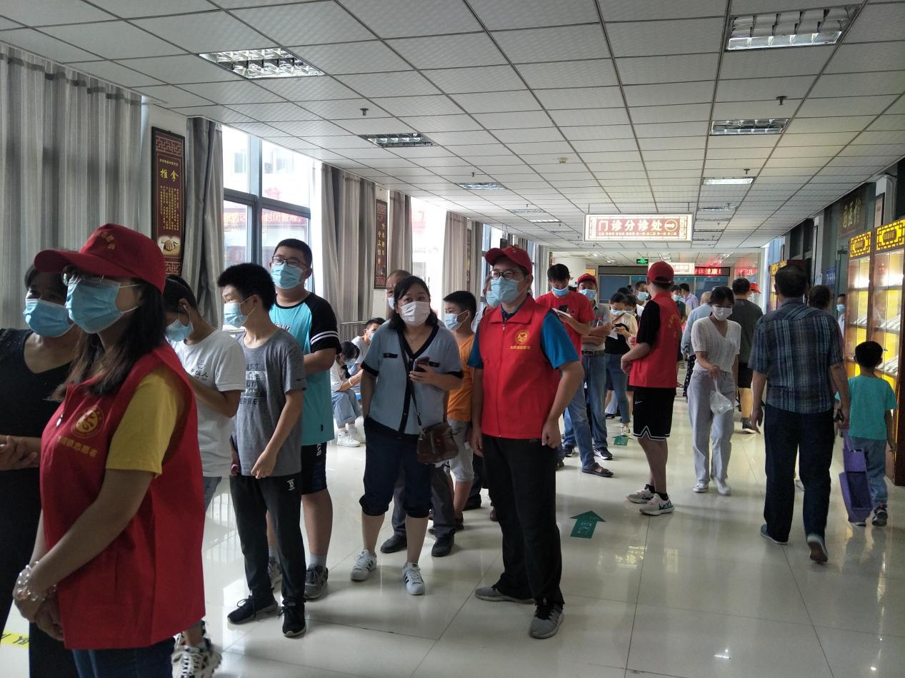 长丰县水湖镇“善根工程”受助大学生助力疫情防控.jpg
