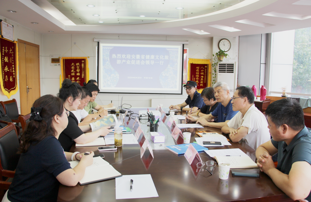 促进会来访屠.png